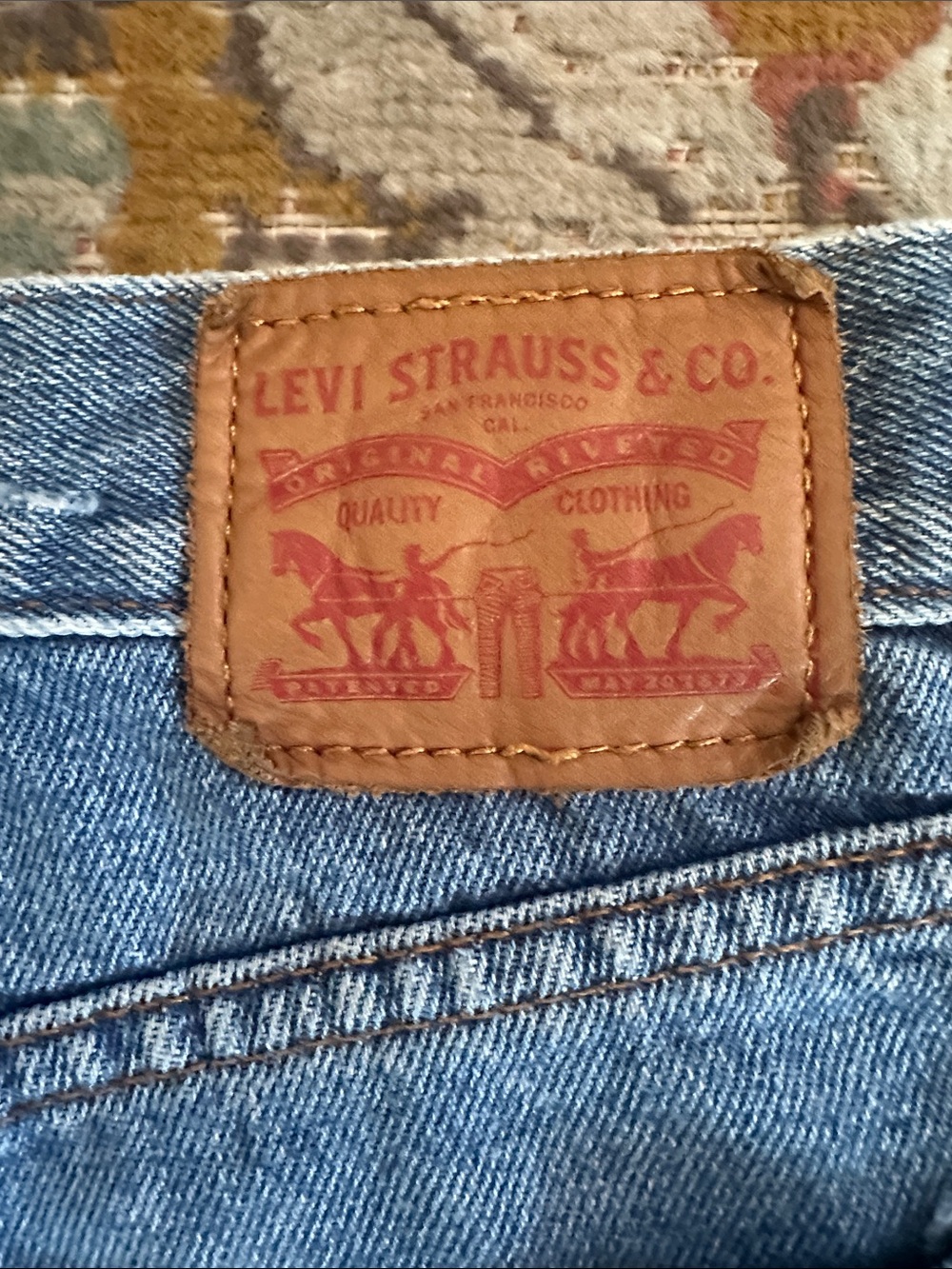 Levi's Light Blue Straight Leg Jeans with Brown Patch